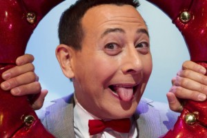 In this Friday, Oct. 29, 2010 photo, Paul Reubens, in character as Pee-wee Herman, poses on stage after a performance of "The Pee-wee Herman Show" on Broadway in New York. (AP Photo/Charles Sykes)